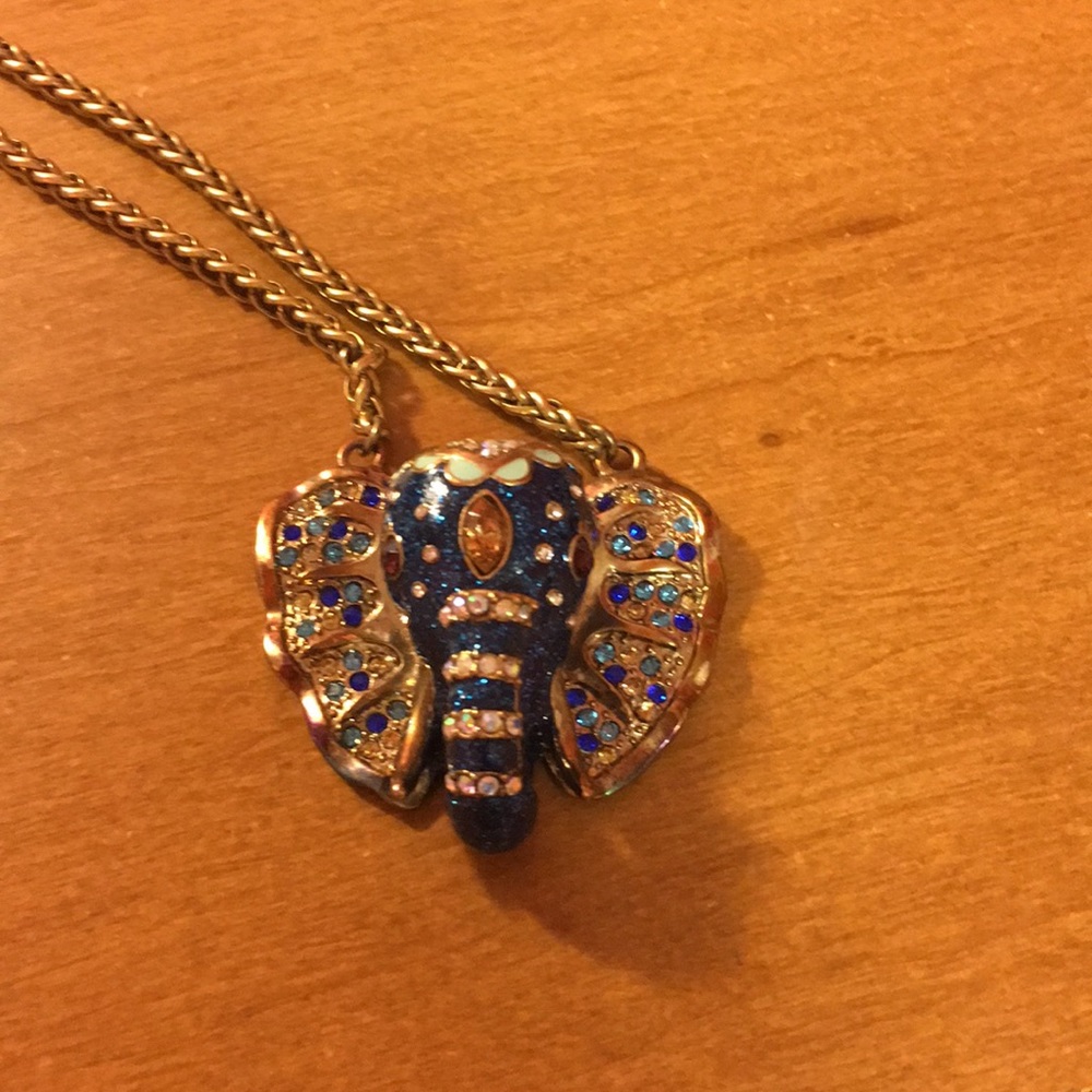 Indigo elephant necklace with golden detailing.